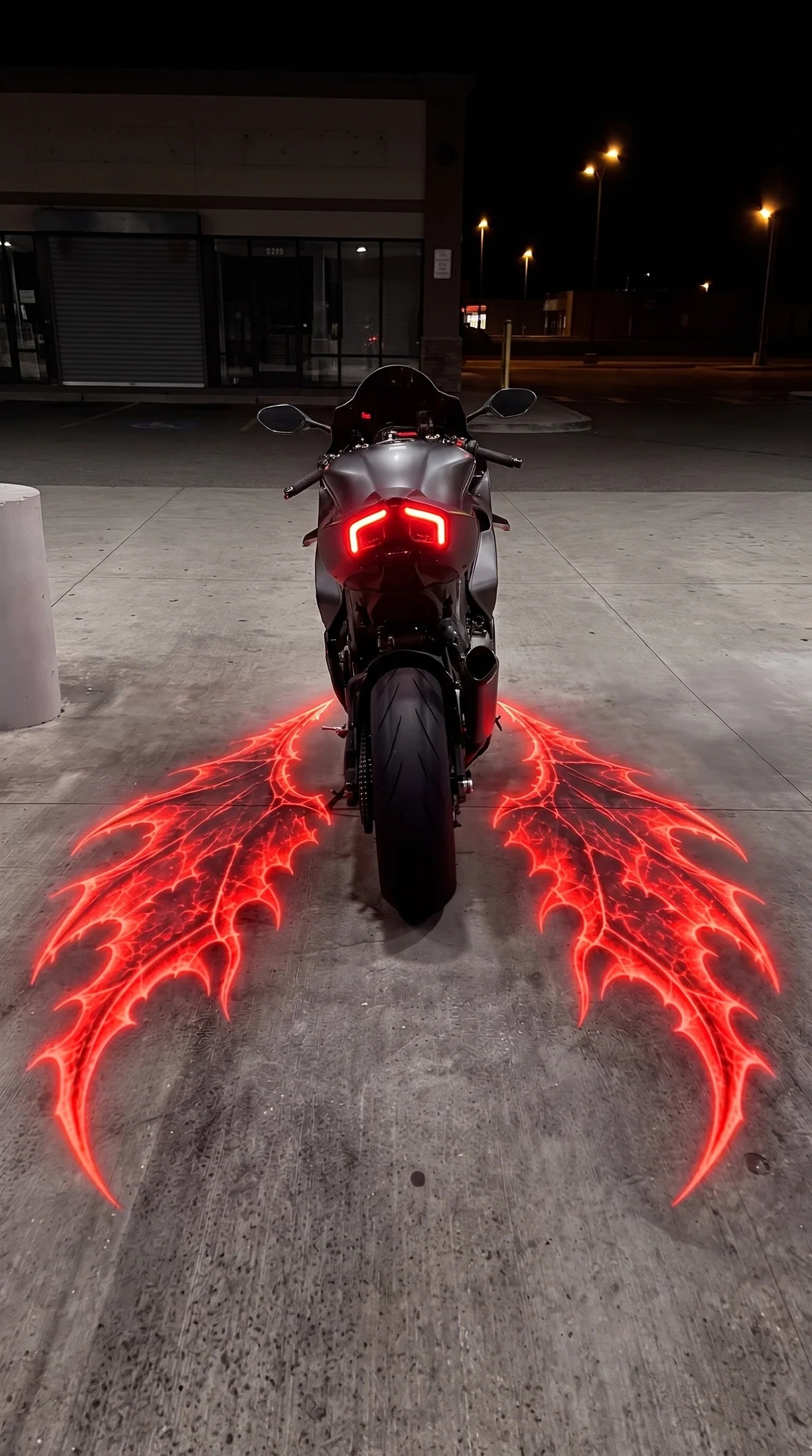 AuraWings motorcycle wing projector in use
